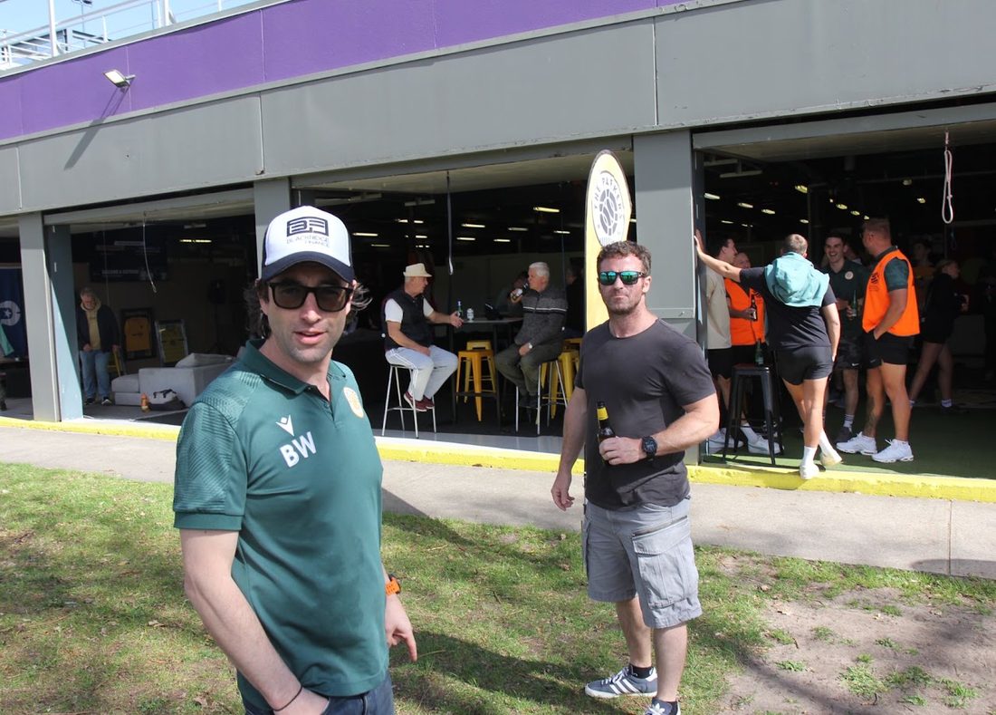 Ben Witten at the Middle Park FC clubhouse with a fellow club member